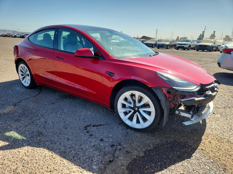 2022 Tesla Model 3 VIN 5YJ3E1EA1NF303934 COPART salvage auction — SIDE, AZ - CERTIFICATE OF TITLE, sold $3,650 on 2026-07-20 (photo 4)