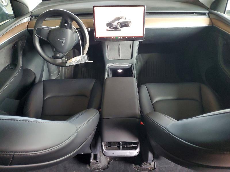 2023 Tesla Model y VIN 7SAYGDEE6PF599866 COPART salvage auction — REAR END, Ca - Salvage Certificate, sold $7,200 on 2026-07-16 (photo 8)