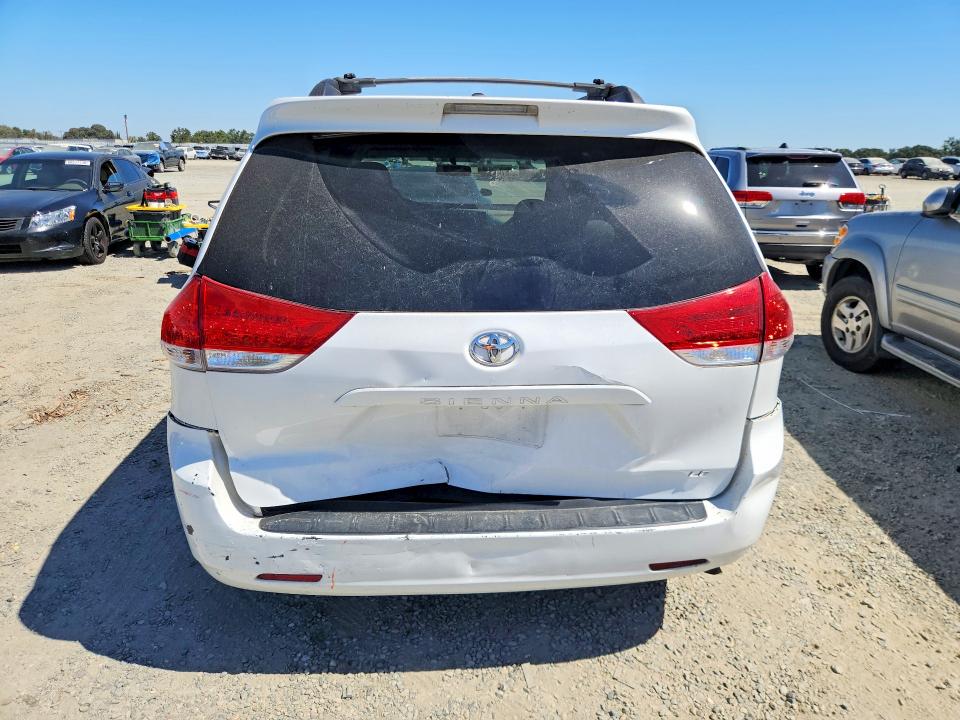 2011 Toyota Sienna VIN 5TDKK3DC7BS085346 COPART salvage auction — REAR END, CA - SALVAGE CERTIFICATE, sold $400 on 2026-07-21 (photo 6)