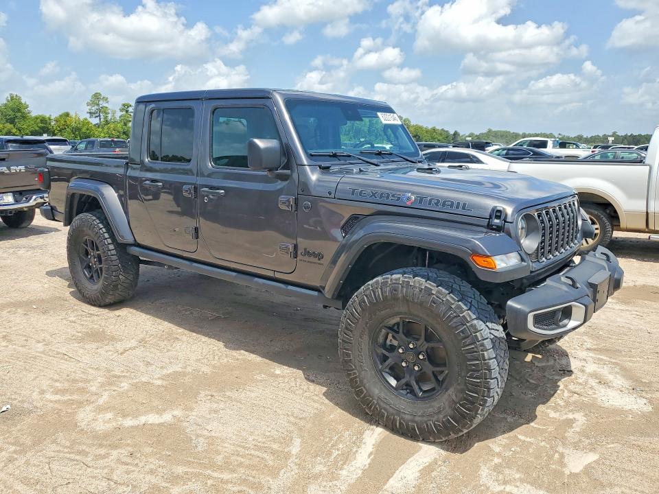 2025 Jeep Gladiator VIN 1C6PJTAG7SL505616 COPART salvage auction — WATER/FLOOD, Tx - Salvage Title-Flood Damage, sold $14,400 on 2026-07-28 (photo 4)