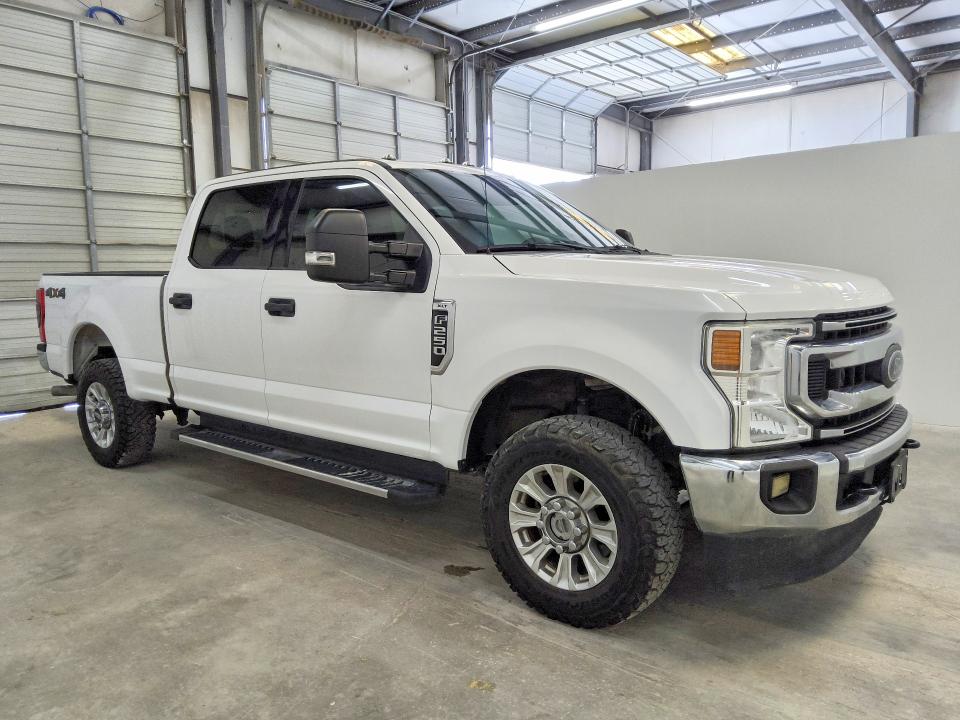 2021 Ford F-250 super duty VIN 1FT7W2B68MEC24698 COPART salvage auction — NORMAL WEAR, TX - CERTIFICATE OF TITLE, sold $18,200 on 2026-07-28 (photo 4)