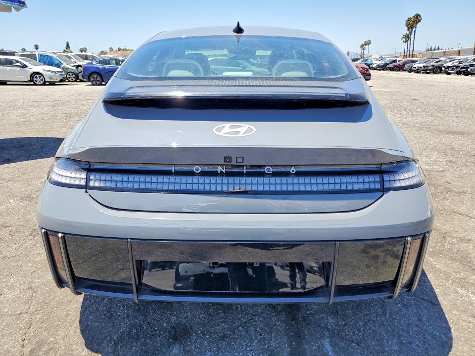 2023 Hyundai Ioniq 6 VIN KMHM54AA8PA045768 COPART salvage auction — DAMAGE HISTORY, CA - CERT OF TITLE-SALVAGED, sold $13,700 on 2026-07-31 (photo 6)