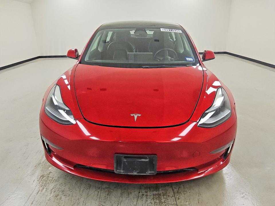 2022 Tesla Model 3 VIN 5YJ3E1EB3NF290872 COPART salvage auction — ALL OVER, TX - CERTIFICATE OF TITLE, sold $3,350 on 2026-07-20 (photo 5)