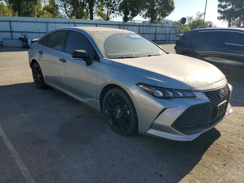 2022 Toyota Avalon VIN 4T1EA1ABXNU015366 COPART salvage auction — REAR END, Ca - Dis/Dlr/Exp Clean W/Salv Hist, sold $10,500 on 2026-08-04 (photo 4)