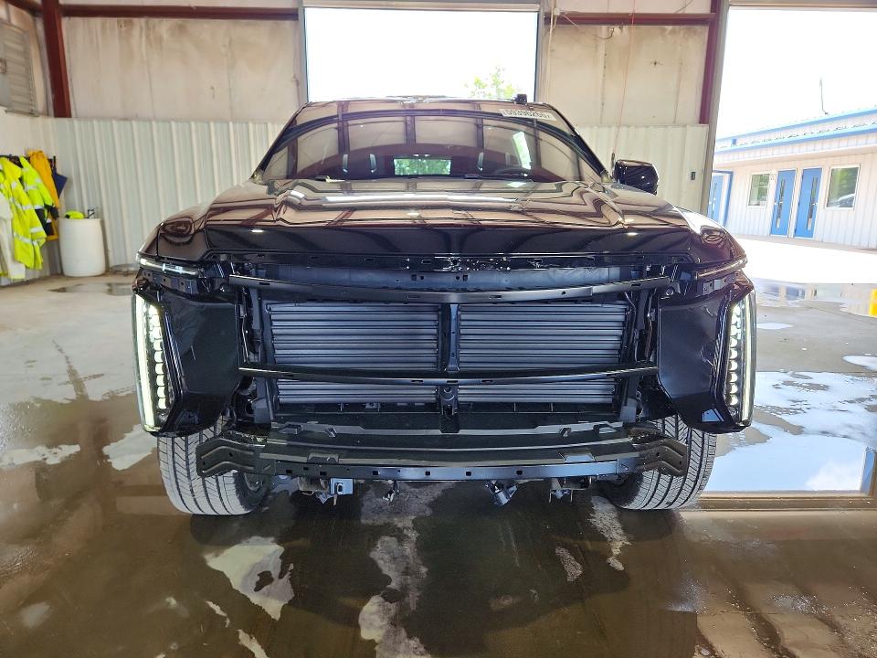 2025 Cadillac Escalade esv VIN 1GYS9RRL4SR331561 COPART salvage auction — ALL OVER, NY - CERTIFICATE OF TITLE, sold $68,000 on 2026-07-27 (photo 5)