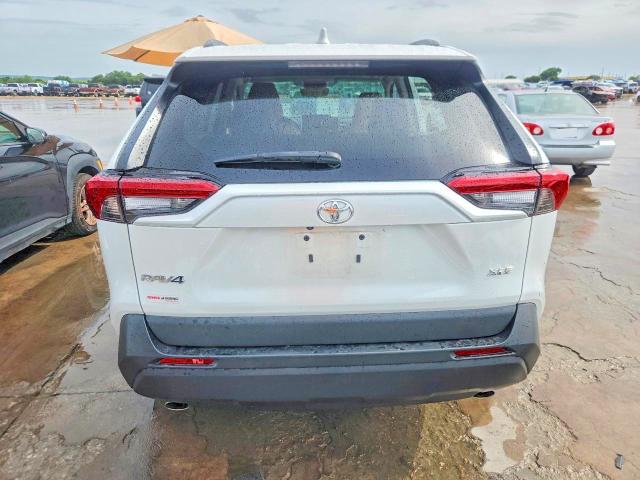 2024 Toyota Rav4 VIN 2T3C1RFVXRW308920 COPART salvage auction — SIDE, TX - SALVAGE VEHICLE TITLE, sold $10,100 on 2026-08-27 (photo 6)