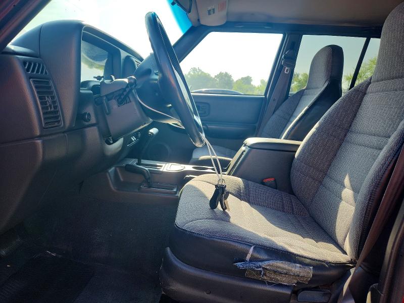 1999 Jeep Cherokee VIN 1J4FF68S5XL614739 COPART salvage auction — NORMAL WEAR, Il - Certificate Of Title, sold $375 on 2026-07-08 (photo 7)