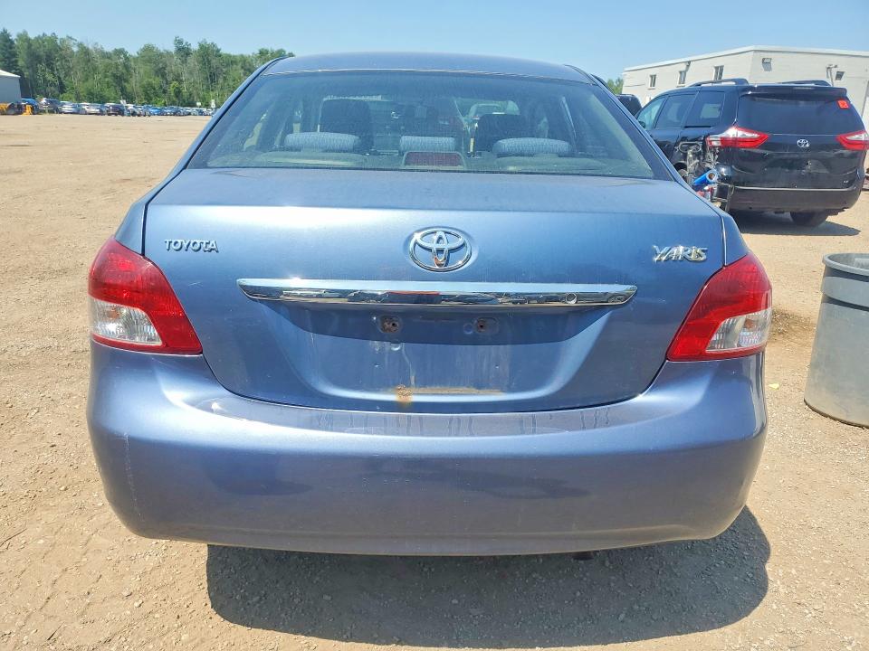 2009 Toyota Yaris VIN JTDBT923491310123 COPART salvage auction — SIDE, On - Permit Salvage, sold $350 on 2026-07-28 (photo 6)