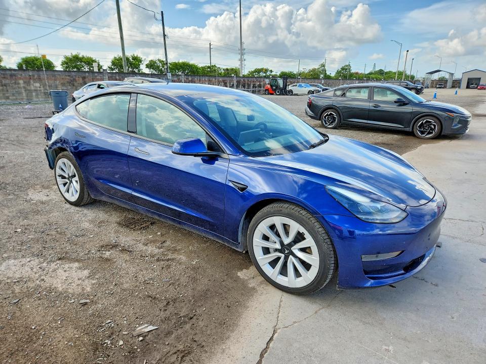 2022 Tesla Model 3 VIN 5YJ3E1EA2NF289901 COPART salvage auction — REAR END, FL - CERTIFICATE OF TITLE, sold $6,300 on 2026-07-20 (photo 4)