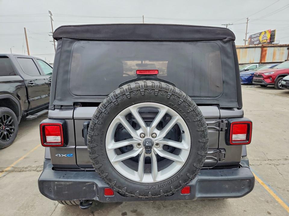 2021 Jeep Wrangler / VIN 1C4JJXP65MW749934 COPART salvage auction — SIDE, Tx - Dis/Dlr/Exp Only Salvage Title, sold $16,000 on 2026-07-27 (photo 6)