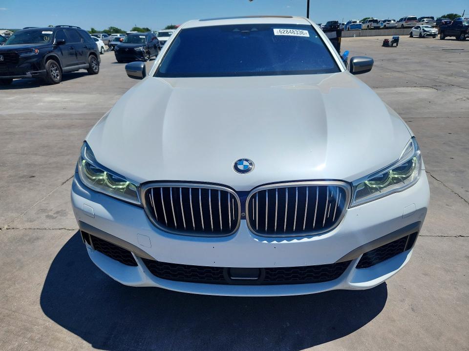 2019 BMW M760i xdrive VIN WBA7H6C58KG615050 COPART salvage auction — NORMAL WEAR, TX - SALVAGE VEHICLE TITLE (P), sold $8,600 on 2026-07-30 (photo 5)