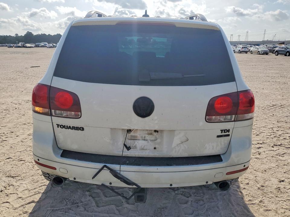 2010 Volkswagen Touareg VIN WVGFK7A93AD000946 COPART salvage auction — SIDE, TX - SALVAGE VEHICLE TITLE (P), sold $1,600 on 2026-08-07 (photo 6)