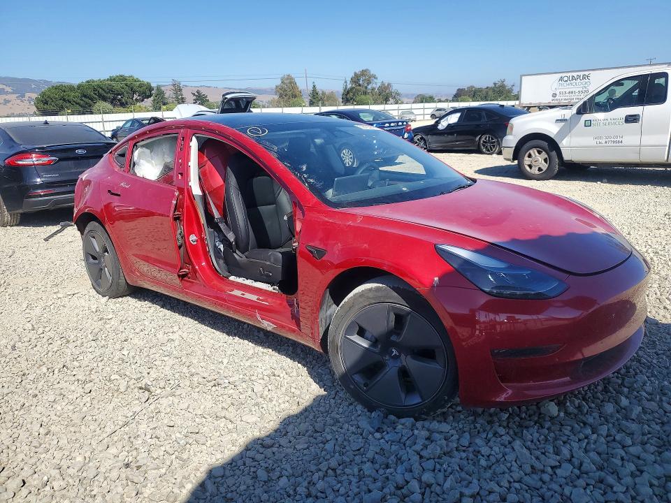 2023 Tesla Model 3 VIN 5YJ3E1EA8PF556509 COPART salvage auction — REAR END, Ca - Salvage Certificate, sold $4,850 on 2026-07-28 (photo 4)