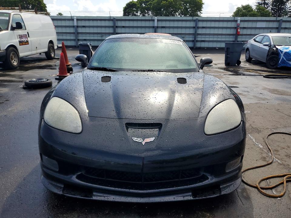 2009 Chevrolet Corvette VIN 1G1YY26W695109574 COPART salvage auction — NORMAL WEAR, FL - CERT OF TITLE-REBUILT, sold $15,100 on 2026-07-29 (photo 5)