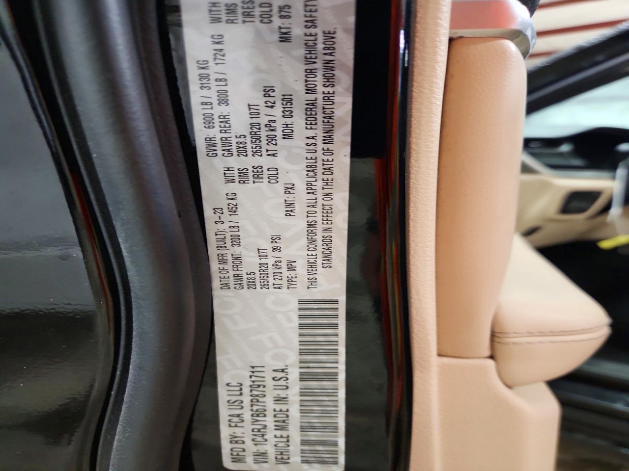 2023 Jeep VIN 1C4RJYB67P8791711 COPART salvage auction — SIDE, Nj - Certificate Of Title, sold $13,300 on 2026-08-04 (photo 4)