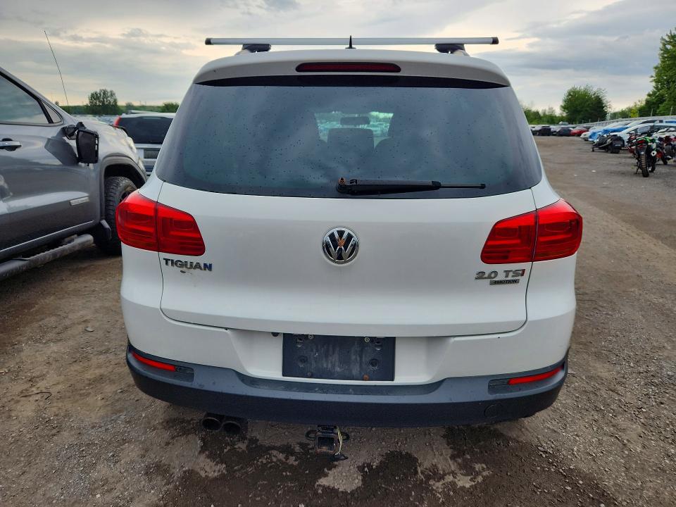 2014 Volkswagen Tiguan VIN WVGJV3AX2EW524026 COPART salvage auction — MECHANICAL, On - Permit No Brand - Unfit, sold $200 on 2026-07-28 (photo 6)