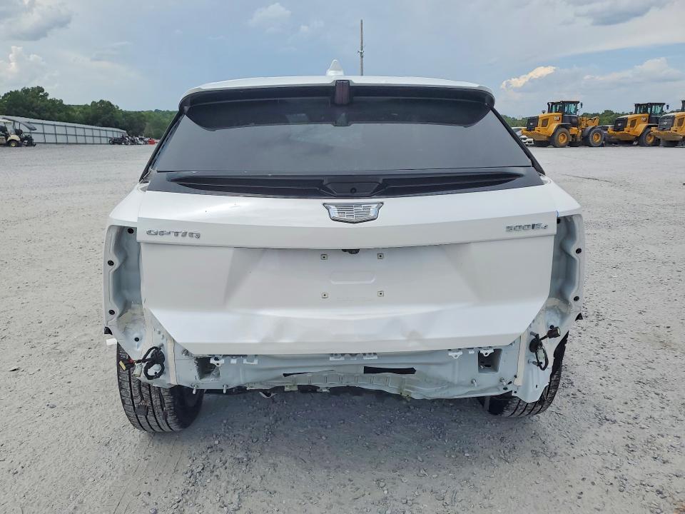 2025 Cadillac Optiq VIN 3GYK3DMR4SS216794 COPART salvage auction — REAR END, Nc - Salvage Certificate Of Title, sold $16,600 on 2026-08-19 (photo 6)