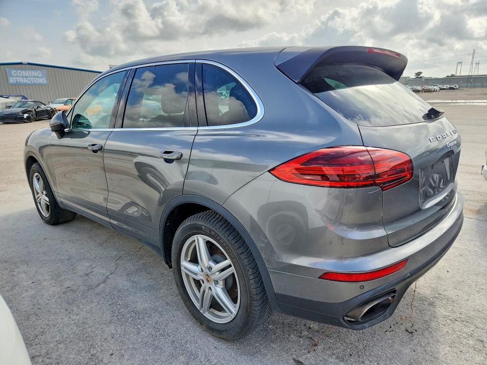 2016 Porsche Cayenne VIN WP1AA2A24GLA03925 COPART salvage auction — WATER/FLOOD, TX - SALVAGE TITLE-FLOOD DAMAGE, sold $7,200 on 2026-07-31 (photo 2)