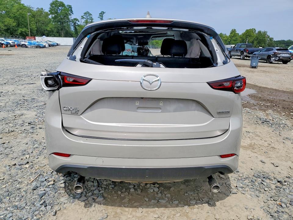 2025 Mazda Cx-5 VIN JM3KFBCM9S0802395 COPART salvage auction — ROLLOVER, FL - CERTIFICATE OF DESTRUCTION, sold $7,300 on 2026-07-28 (photo 6)