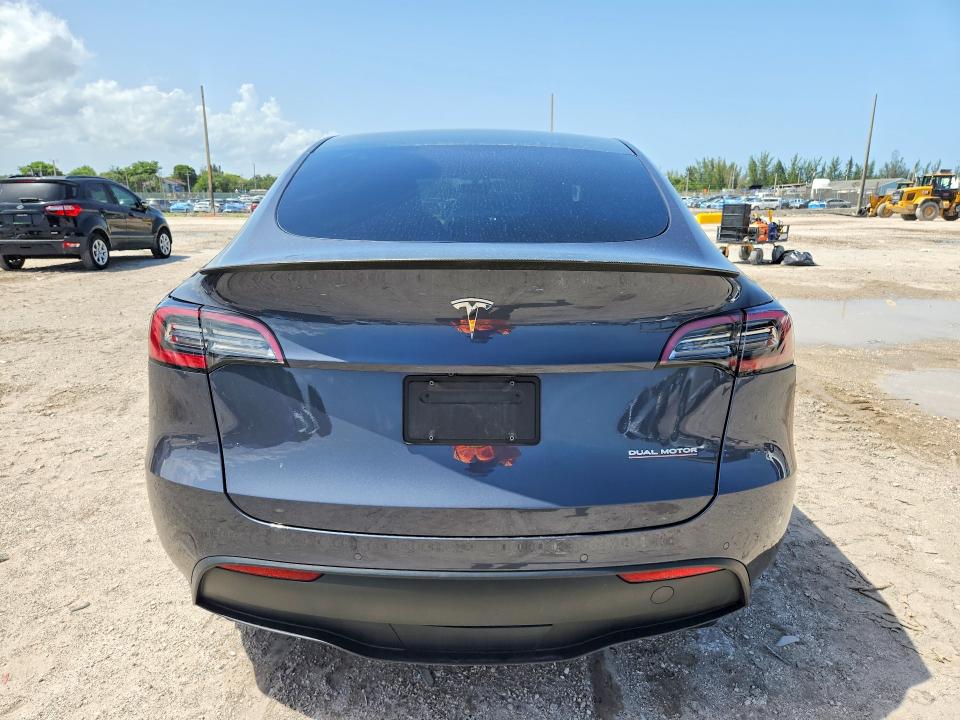 2020 Tesla Model y VIN 5YJYGDEF8LF011434 COPART salvage auction — MINOR DENT/SCRATCHES, FL - CERT OF TITLE SLVG REBUILDABLE, sold $11,100 on 2026-07-23 (photo 6)