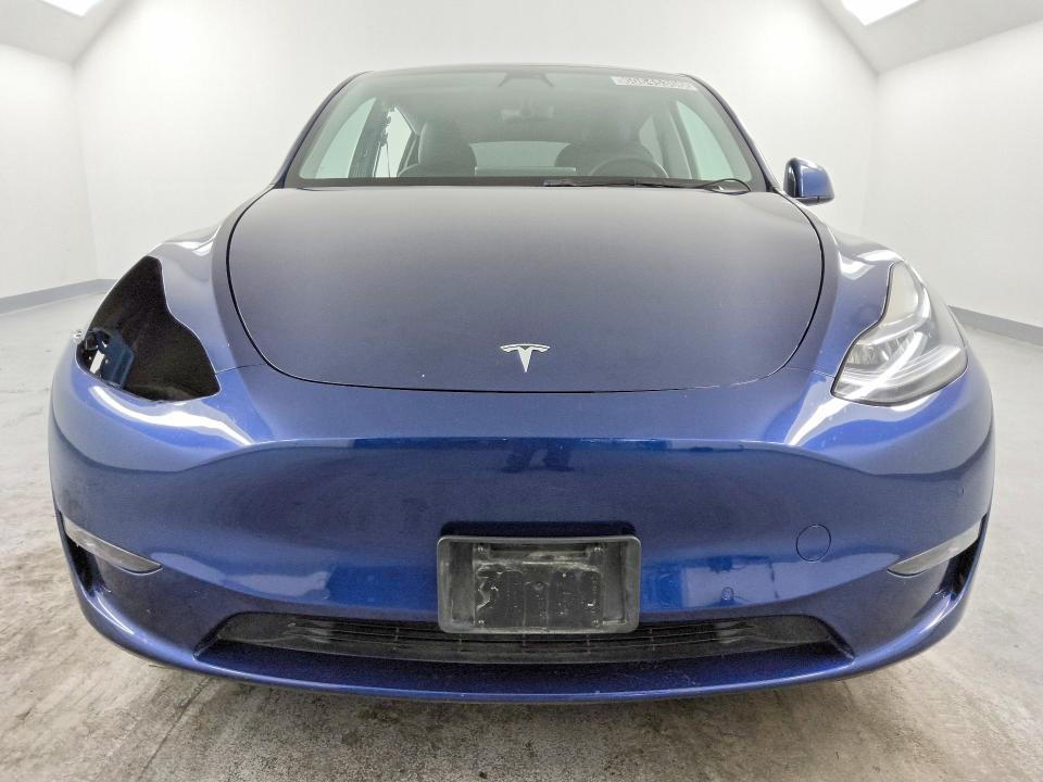 2022 Tesla Model y VIN 7SAYGDEE3NF481237 COPART salvage auction — SIDE, NV - CERTIFICATE OF TITLE, sold $9,700 on 2026-07-20 (photo 5)
