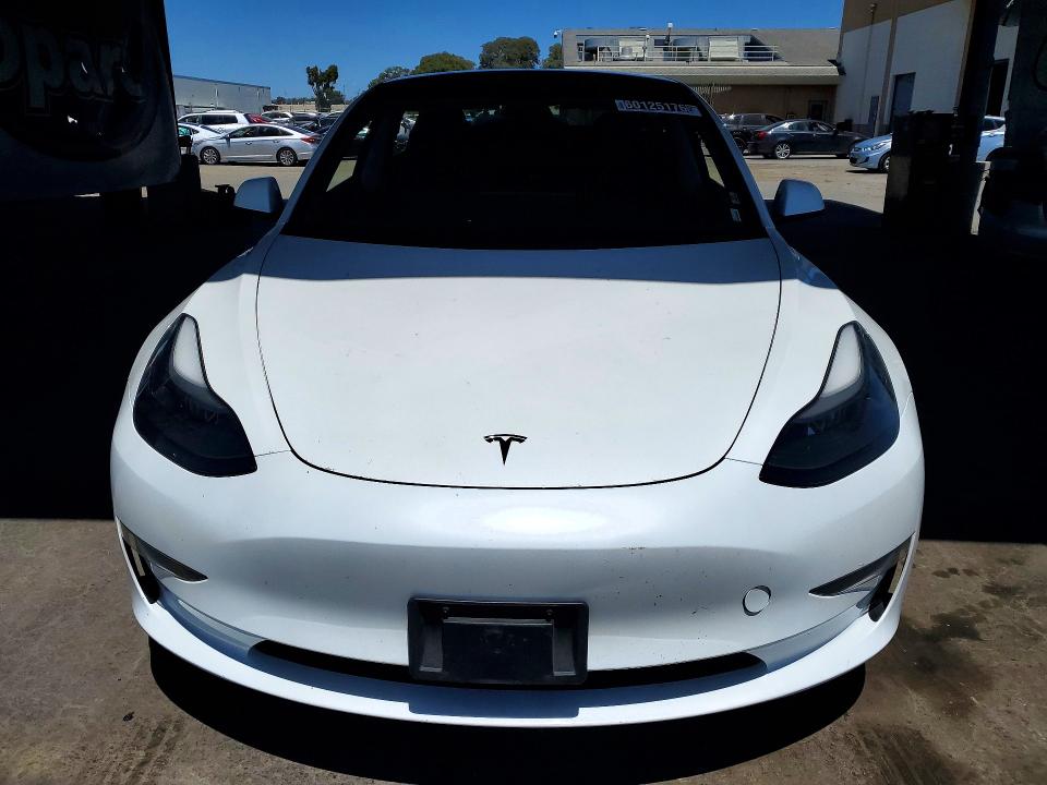 2023 Tesla Model 3 VIN 5YJ3E1EA7PF541256 COPART salvage auction — REAR END, CA - CERTIFICATE OF TITLE (P), sold $14,600 on 2026-07-13 (photo 5)