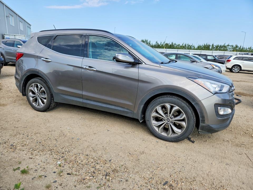 2014 Hyundai Santa fe VIN 5XYZUDLA9EG215384 COPART salvage auction — MECHANICAL, Salvage Title, sold $2,200 on 2026-07-23 (photo 4)
