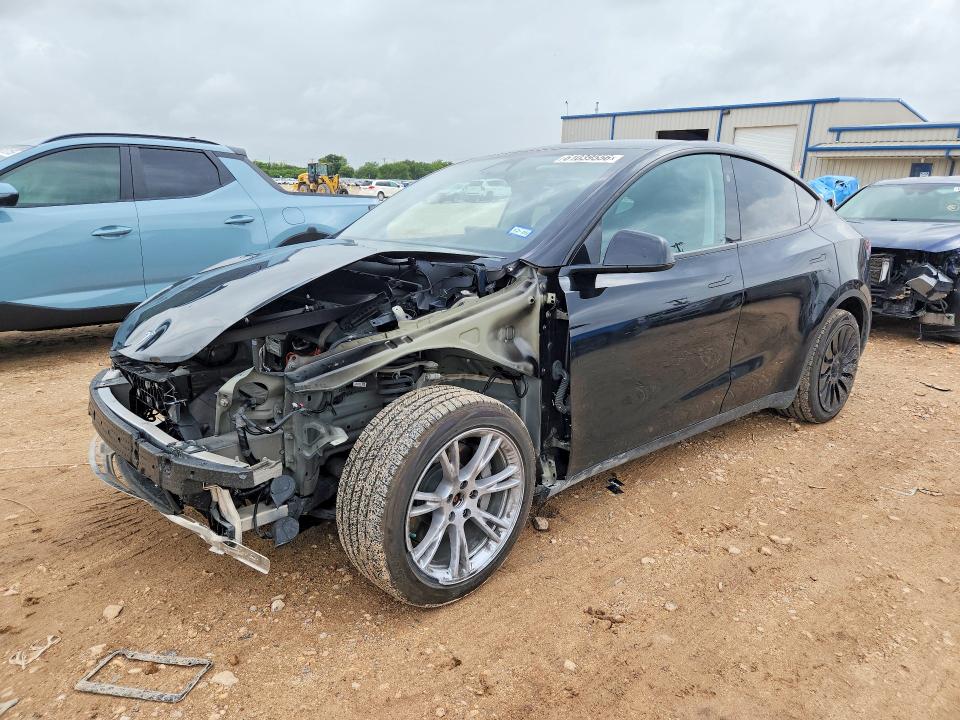 2023 Tesla Model y VIN 7SAYGDEE7PA202775 COPART salvage auction — FRONT END, Tx - Salvage Vehicle Title, sold $9,600 on 2026-07-23 (photo 1)
