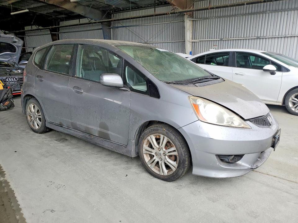 2010 Honda Fit VIN JHMGE8H64AS025804 COPART salvage auction — SIDE, MA - DIS/DLR/EXP ONLY CLEAN TITLE, sold $1,050 on 2026-07-13 (photo 4)