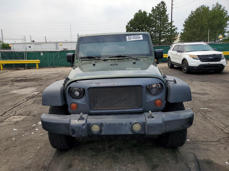 2008 Jeep Wrangler / VIN 1J8FA24108L626883 COPART salvage auction — MINOR DENT/SCRATCHES, CO - DIS/DLR/EXP ONLY CLEAN TITLE, sold $1,050 on 2026-07-09 (photo 5)