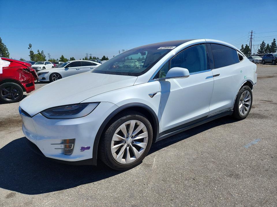 2018 Tesla Model x VIN 5YJXCAE29JF124180 — COPART salvage auction photo