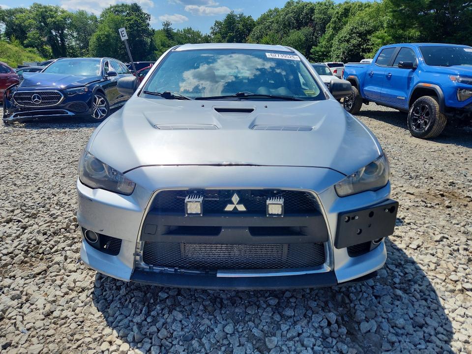 2014 Mitsubishi Lancer VIN JA32W5FV0EU022361 COPART salvage auction — MINOR DENT/SCRATCHES, Va - Certificate Of Title (P), sold $9,300 on 2026-08-24 (photo 5)