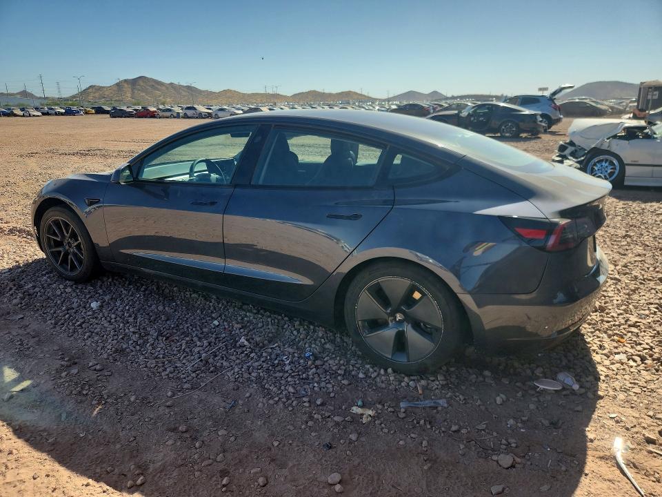 2023 Tesla Model 3 VIN 5YJ3E1EA3PF671809 COPART salvage auction — REAR END, AZ - CERT OF TITLE - SALVAGE, sold $4,450 on 2026-07-23 (photo 2)