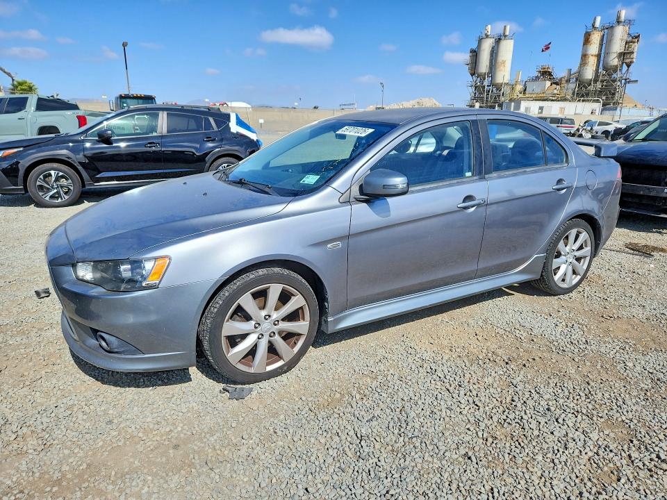 2015 Mitsubishi Lancer VIN JA32U8FW9FU026510 COPART salvage auction — MINOR DENT/SCRATCHES, Ca - Dis/Dlr/Exp Only Clean Title, sold $425 on 2026-07-07 (photo 1)