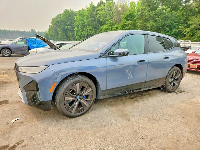 2024 BMW Ix VIN WB523CF02RCP02238 COPART salvage auction — REAR END, Fl - Cert Of Title Slvg Rebuildable, sold $23,700 on 2026-07-28 (photo 1)