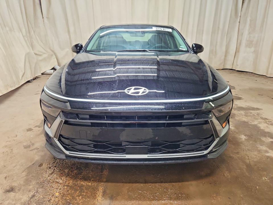 2026 Hyundai Sonata hybrid VIN KMHL24JJ8TA172714 COPART salvage auction — WATER/FLOOD, FL - CERT OF TITLE-SLVG REBLD FLOOD (P), sold $8,900 on 2026-07-27 (photo 5)