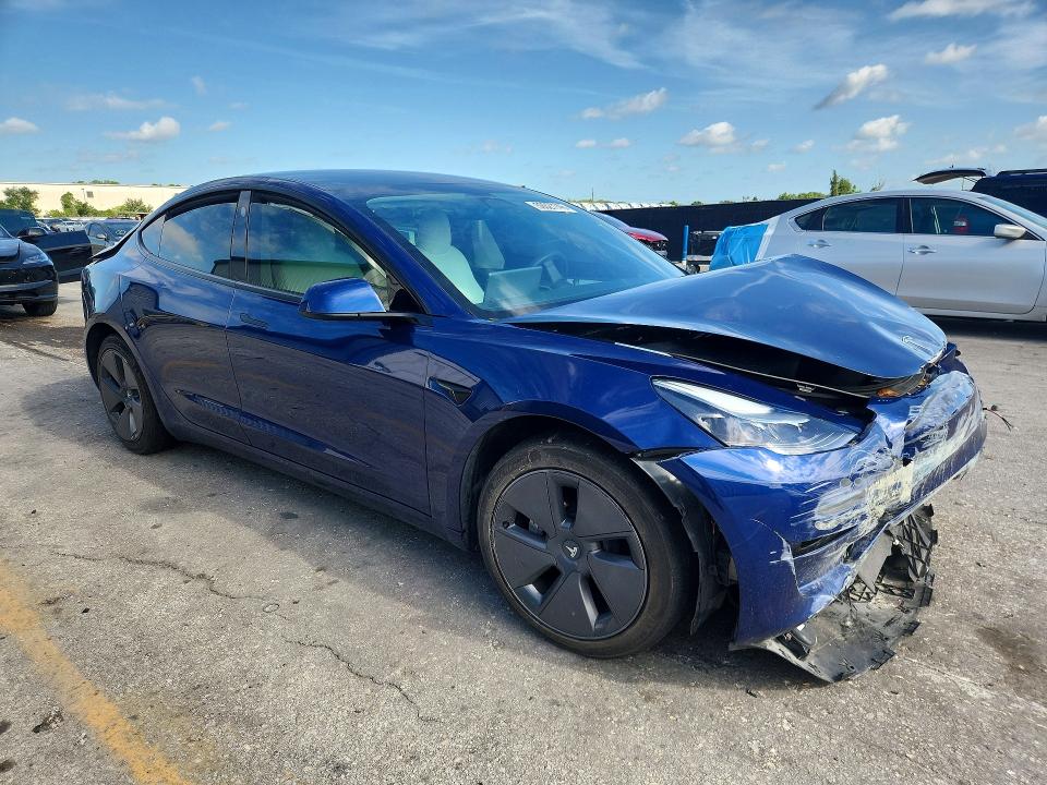 2023 Tesla VIN 5YJ3E1EA4PF412388 COPART salvage auction — FRONT END, Fl - Cert Of Title Slvg Rebuildable, sold $5,400 on 2026-09-10 (photo 4)