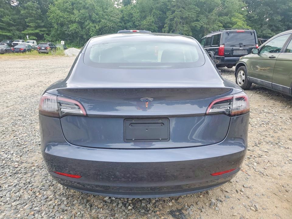 2023 Tesla Model 3 VIN 5YJ3E1EA0PF434596 COPART salvage auction — FRONT END, Fl - Cert Of Title Slvg Rebuildable (P), sold $11,600 on 2026-09-10 (photo 6)