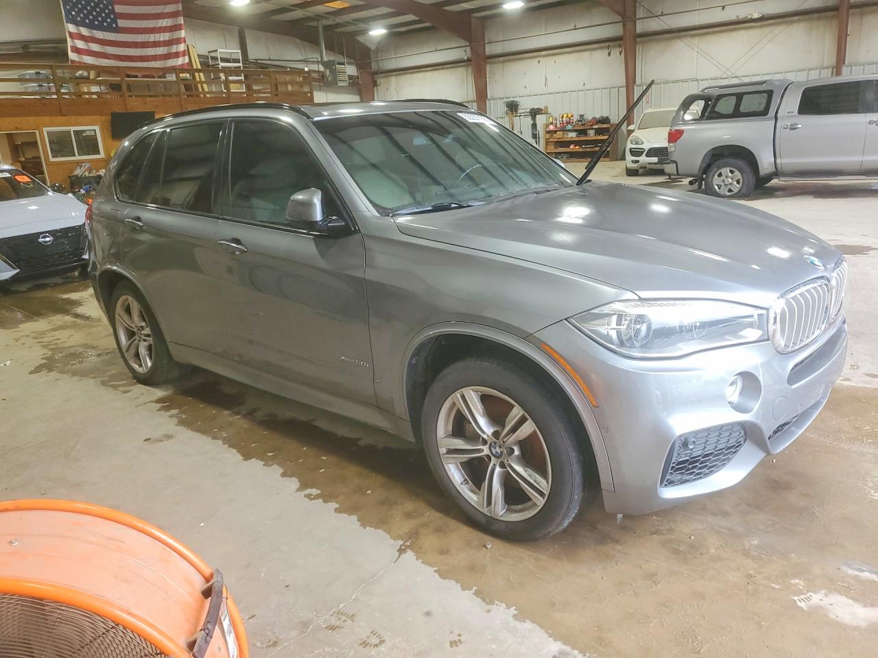 2015 BMW X5 VIN 5UXKR6C57F0J79136 COPART salvage auction — Normal Wear, GA - CERTIFICATE OF TITLE, sold $3,900 on 2026-09-18 (photo 4)