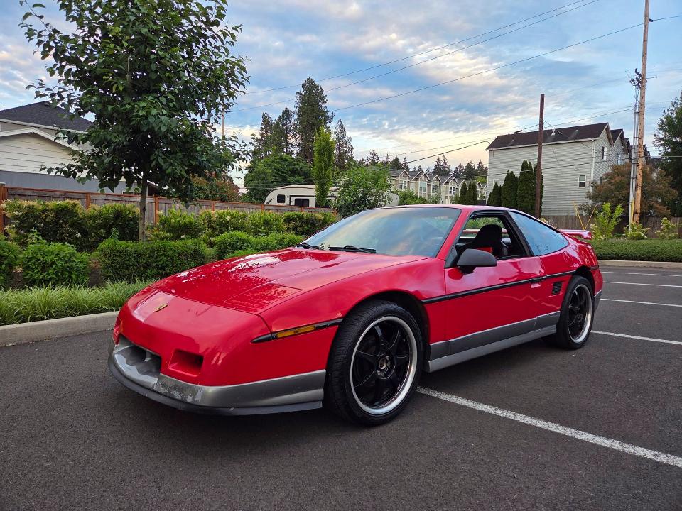 1986 Pont Fiero VIN 1G2PG9797GP281044 COPART salvage auction — NORMAL WEAR, Or - Certificate Of Title (P), sold $13,500 on 2026-07-27 (photo 2)