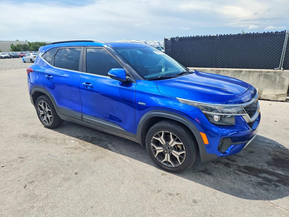 2021 Kia Seltos VIN KNDERCAA8M7088328 COPART salvage auction — MINOR DENT/SCRATCHES, FL - CERTIFICATE OF TITLE, sold $5,500 on 2026-07-14 (photo 4)