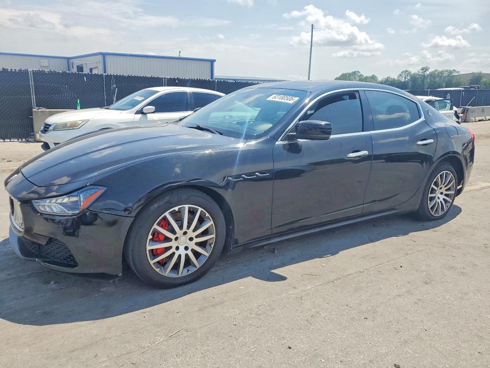 2014 Maserati Ghibli VIN ZAM57RTAXE1090359 COPART salvage auction — MINOR DENT/SCRATCHES, Fl - Certificate Of Title (P), sold $4,950 on 2026-08-28 (photo 1)