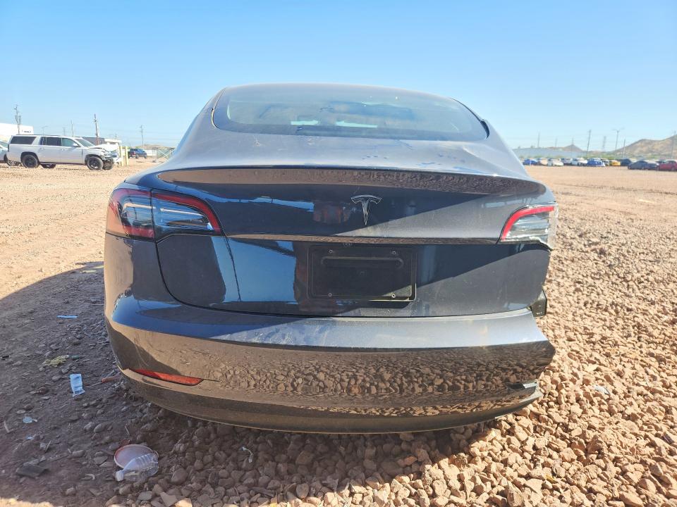 2023 Tesla Model 3 VIN 5YJ3E1EA3PF671809 COPART salvage auction — REAR END, AZ - CERT OF TITLE - SALVAGE, sold $4,450 on 2026-07-23 (photo 6)