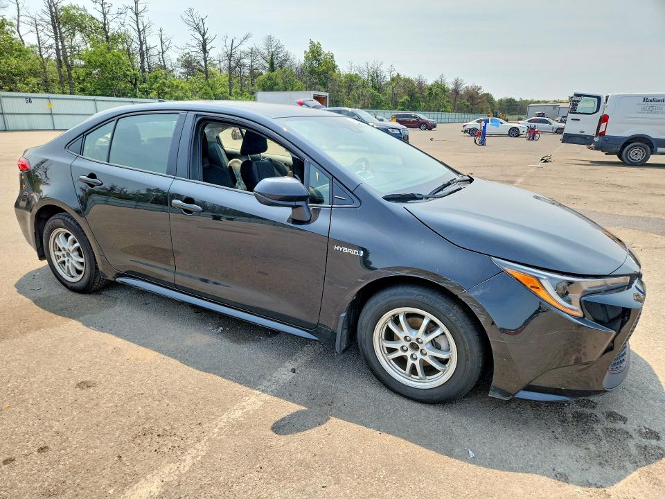 2021 Toyota Corolla VIN JTDEAMDE4MJ015455 COPART salvage auction — SIDE, Ny - Mv-907A Salvage Certificate, sold $6,900 on 2026-07-20 (photo 4)