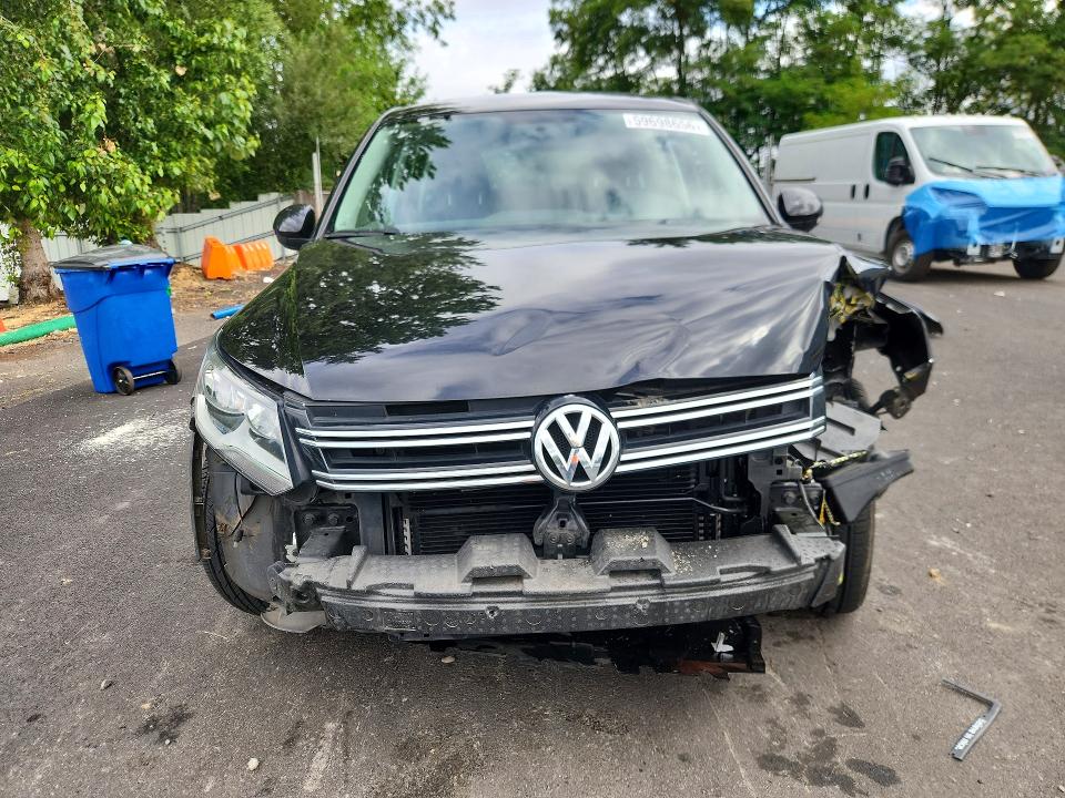 2017 Volkswagen Tiguan VIN WVGBV7AX3HK047405 COPART salvage auction — FRONT END, Or - Salvage Title Certificate, sold $1,450 on 2026-08-12 (photo 5)