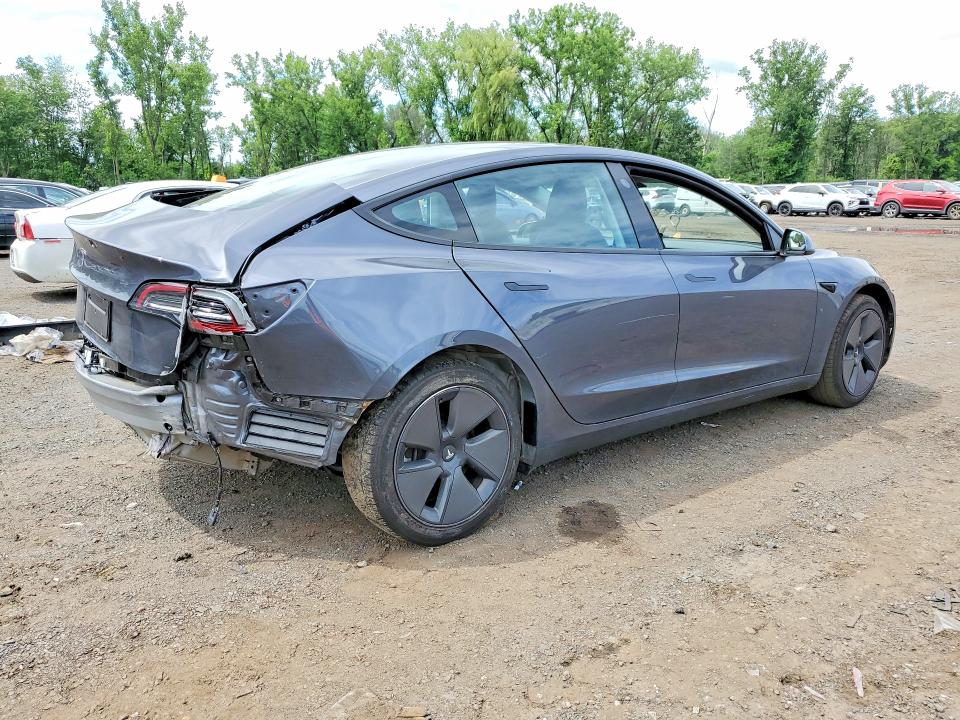 2023 Tesla Model 3 VIN 5YJ3E1EA4PF687243 COPART salvage auction — REAR END, CT - CERT OF TITLE-SALVAGE, sold $3,700 on 2026-07-28 (photo 3)