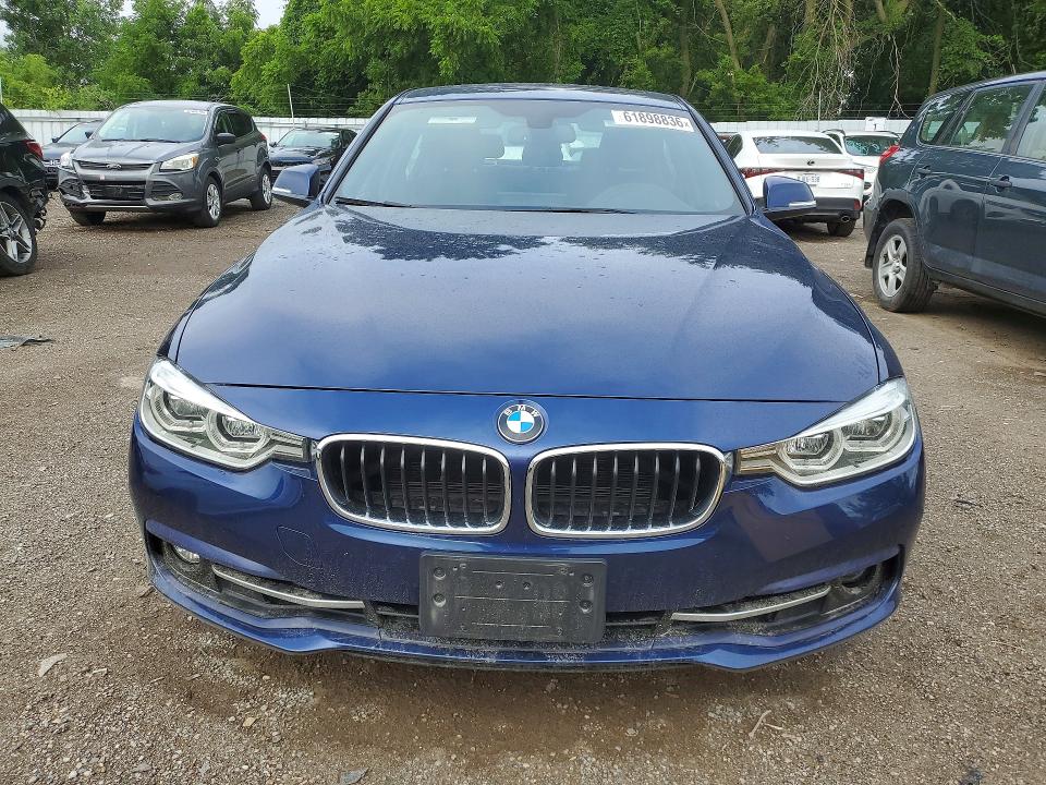 2018 BMW 3 series VIN WBA8D9C51JEM31399 COPART salvage auction — WATER/FLOOD, ON - PERMIT NO BRAND - UNFIT, sold $3,600 on 2026-08-04 (photo 5)
