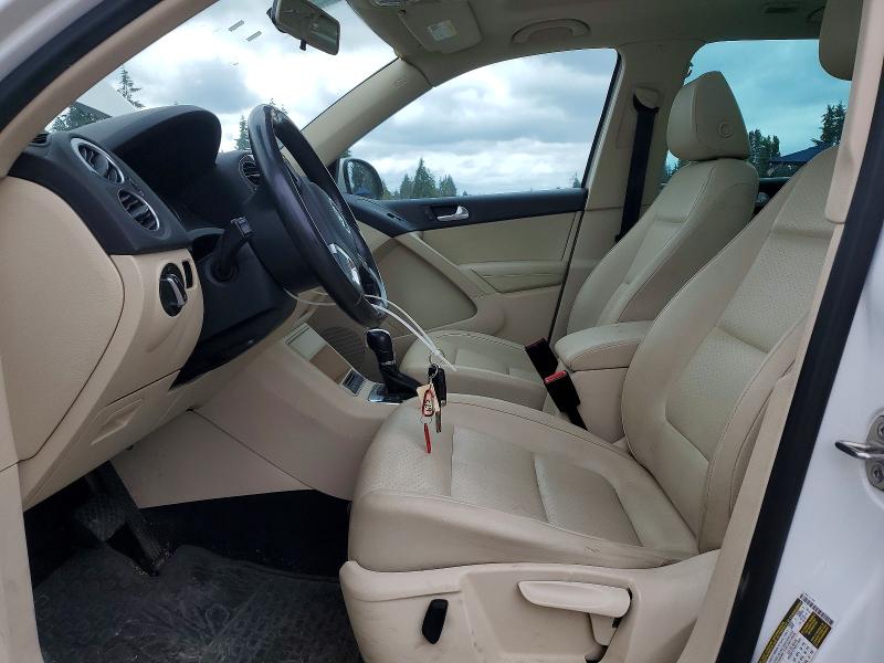 2012 Volkswagen Tiguan VIN WVGBV7AX8CW581906 COPART salvage auction — MINOR DENT/SCRATCHES, Wa - Vehicle Cert Of Ownership-Titl, sold $1,000 on 2026-07-14 (photo 7)