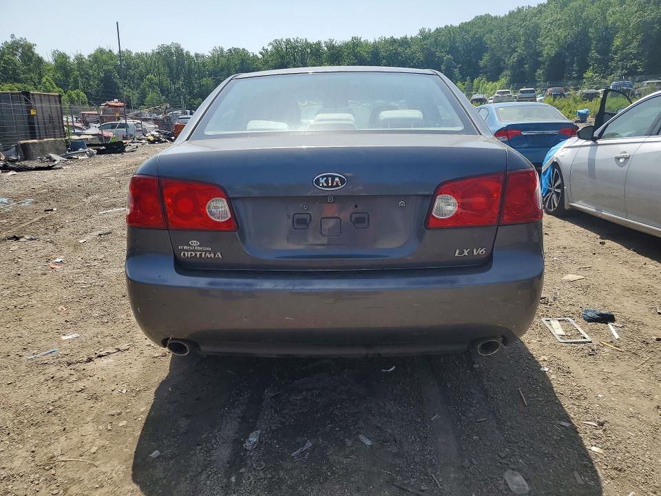 2006 Kia Optima VIN KNAGE124965039832 COPART salvage auction — SIDE, Nc - Salvage Certificate Of Title, sold $125 on 2026-07-30 (photo 6)
