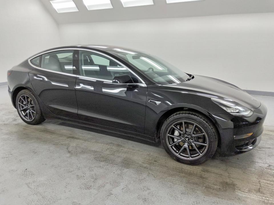 2018 Tesla Model 3 VIN 5YJ3E1EA8JF013863 COPART salvage auction — MINOR DENT/SCRATCHES, CA - CERTIFICATE OF TITLE, sold $14,700 on 2026-07-28 (photo 4)
